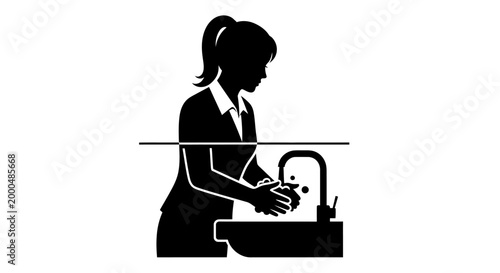 Black silhouette of a woman washing hands in a sink.