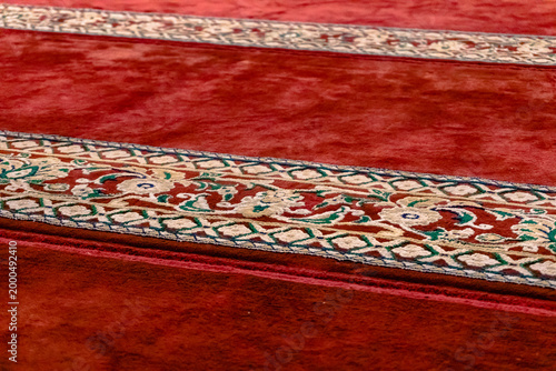 Selected focus photo of the surface of the muslim prayer mat with the Repetition Pattern.