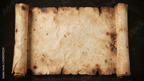 Old aged leather scroll with visible burn marks and creases. Perfect for historical themes or fantasy scenes.