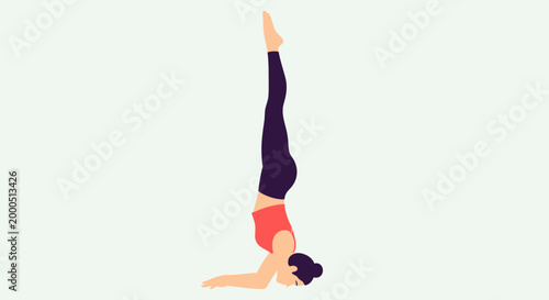 Woman performing a yoga headstand pose, balancing on head and forearms