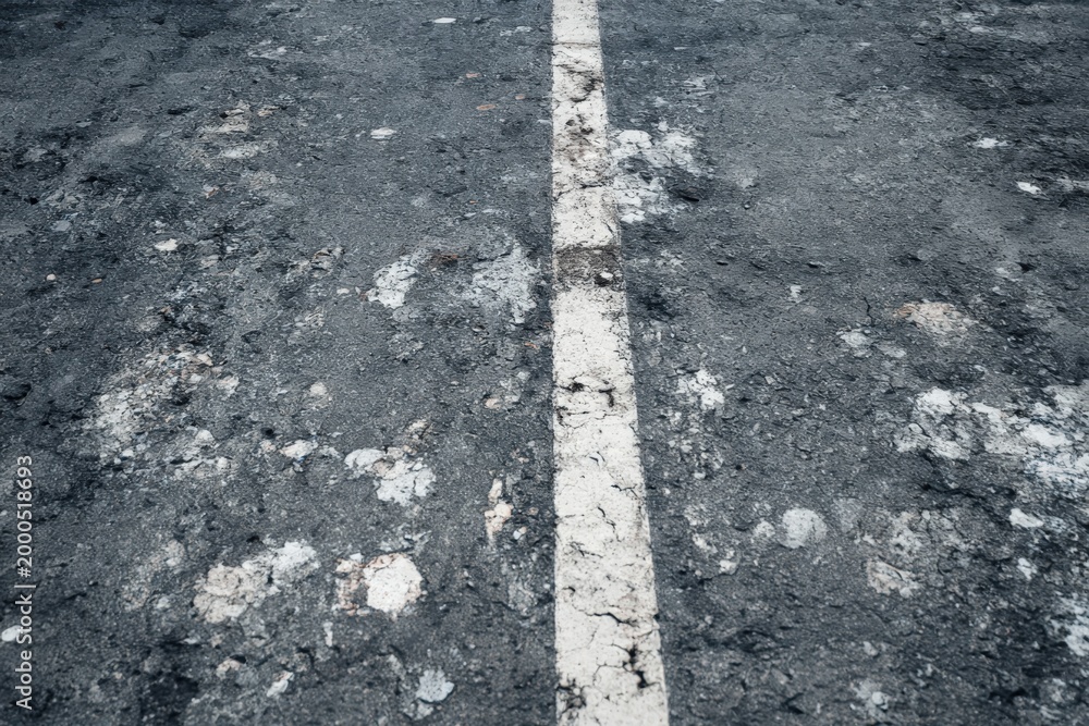Fototapeta premium Seamless Old Asphalt Road Texture with Faded White Line 8K Weathered Cracked Urban Surface Background Pattern Detail