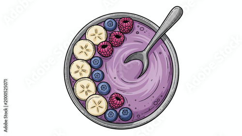 a bowl of purple smoothie with fruit toppings and a spoon