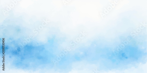 Beautiful white fluffy clouds drift across a bright clear blue sky on a sunny summer day creating a peaceful abstract nature background with soft sunlight and a heaven-like atmosphere