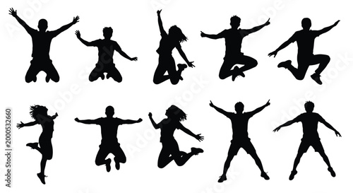 Diverse group of silhouetted people jumping in the air with arms outstretched celebrating freedom and joy
