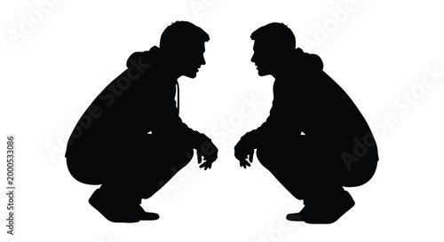 Two men in silhouette squatting down facing each other in a conversation