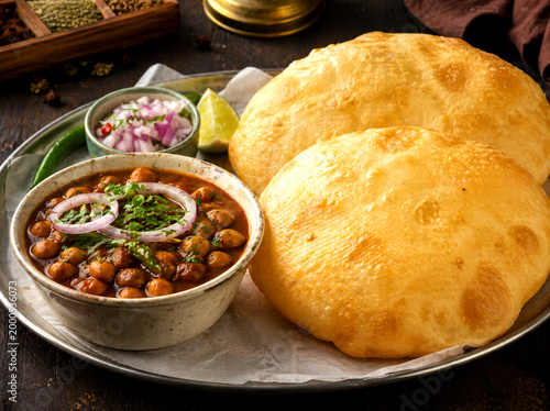 Delhi Style Chole Bhature with Spicy Chickpea Curry and Fluffy Fried Bread, Authentic Indian Street Food, Rustic Food Photography, Top View, High Resolution 4K