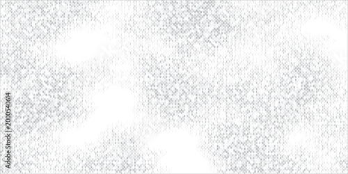 Soft winter frost abstract background with delicate white and grey dithered ice crystals.