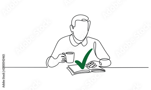 Man with coffee cup and book enjoys a moment of accomplishment.