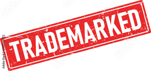 Grunge red rubber stamp impression with the word Trademarked at an angle
