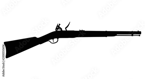 silhouette of rifle with miniature figure on barrel