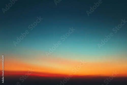 A serene gradient of color depicts a tranquil sunset or sunrise scene.