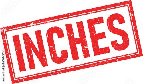 Red Inches Text Inside a Distressed Rectangular Rubber Stamp Impression on White