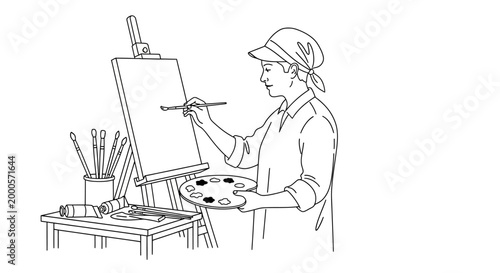 Woman artist painting on easel with palette and brushes