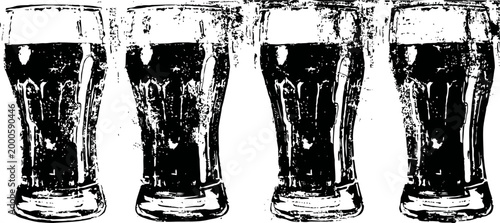 Four dark beer glasses lined up, filled with frothy beer, isolated on white background