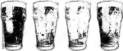 Four foamy beer glasses lined up on white background with condensation drops