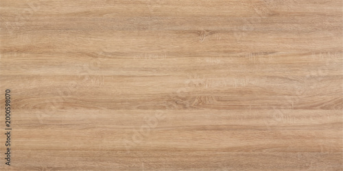 A natural wood grain texture showcases the intricate details of wood.  