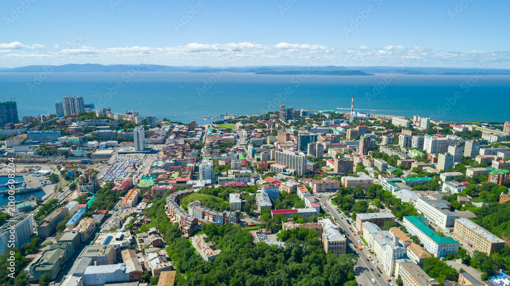 Fototapeta premium Vladivostok city panorama overlooking Golden Horn Bay and Amur Bay on a clear sunny day