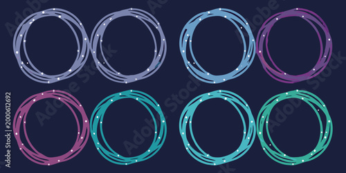 glowing orbital rings with colorful outlines on dark background