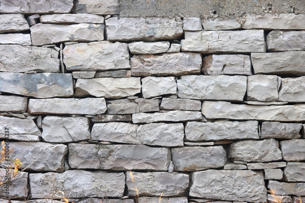 Fototapeta premium Traditional stone drywall. Old house in Croatia.