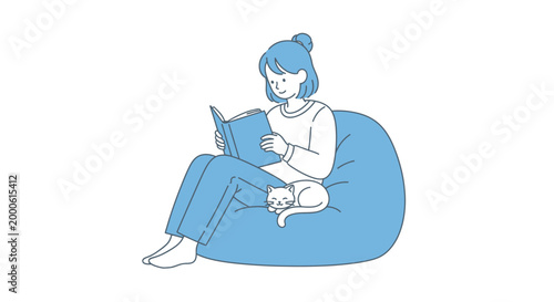 Woman reads book on bean bag chair with cat resting