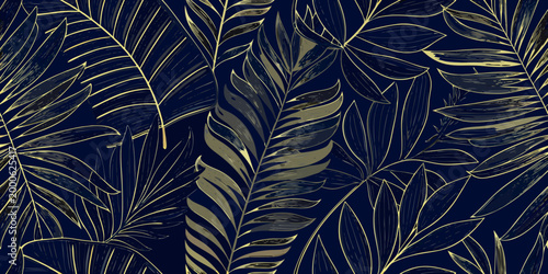 Foto overlapping leaves pattern in gold and navy blue
