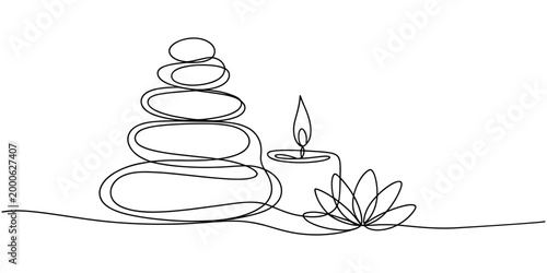 Photography Single line of stacked spa stones with lit candle and lotus flower stacked stone