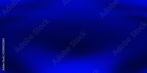 Photos Abstract deep blue grainy background with soft vignette
