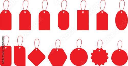 Red gift tags and labels in various shapes with string.