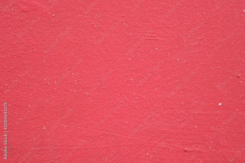 Fototapeta premium Vivid red painted concrete wall texture background