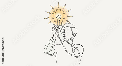 Man holding light bulb idea inspiration.