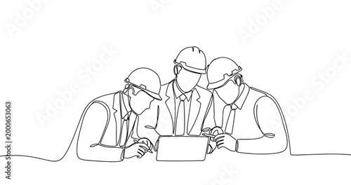 Engineers in hard hats discussing project plans around laptop. No editable stroke