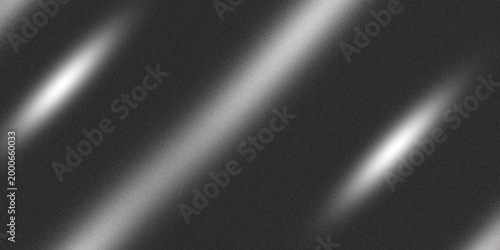 Abstract gray background with diagonal white streaks and blurred light effects
