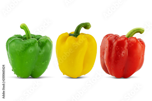 Three fresh green, yellow and red bell peppers on white background with clipping path