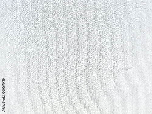 soft white knitted fabric texture closeup minimalist serene cotton weave pattern subtle blue gradient calm abstract backdrop