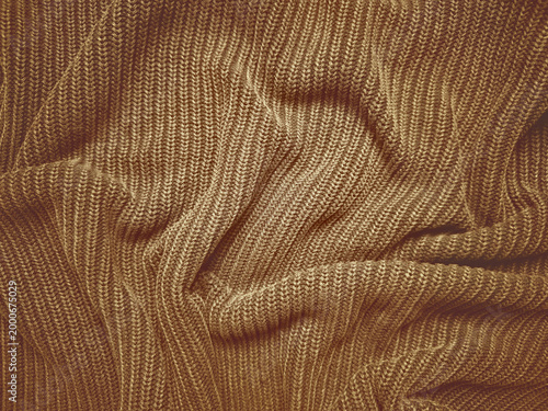 Photos brown ribbed knit fabric texture undulating in soft warm folds evoking cozy vint