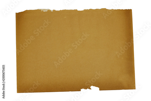 Torn Brown Paper Sheet With Vintage Texture and Ragged Edges On White Background