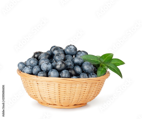 Blueberries basket isolated on a white background, contour