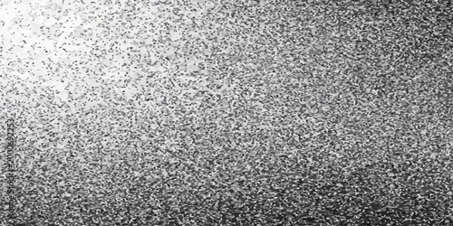 A grunge dark grey metal texture background features a rough abstract pattern with a textured surface reminiscent of weathered asphalt and stone material