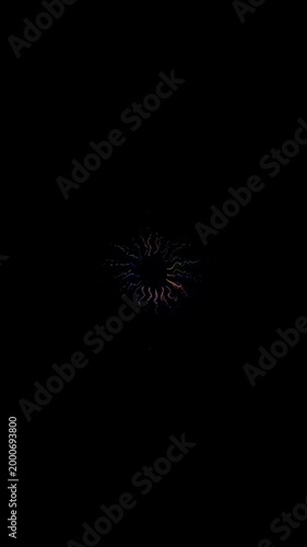 Transformative Visual Journey: Exploring the Metamorphosis from a Simple Point of Light to a Vibrant Explosion of Color and Patterns in a Dark Surrounding