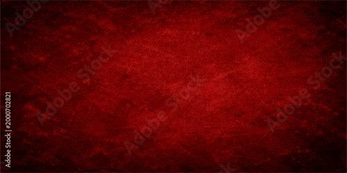 Vintage Inspired Deep Red Grunge Texture with Darkened Vignette Borders, Rough Distressed Details, and Scratch Mark Patterns for Abstract Artistic and Creative Background Use.