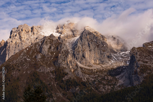 view of autumnal forest in Trentino Alto Adige with warm colors	