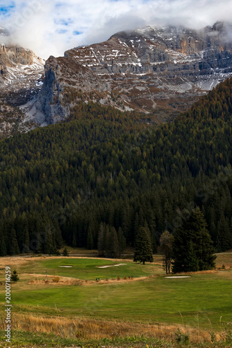 view of autumnal forest in Trentino Alto Adige with warm colors	