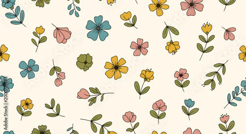 Lovely spring flowers scattered on cream background
