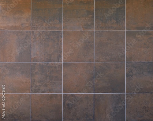 Schilderij op canvas Stoneware coating made of large square tiles with rusted metal effect