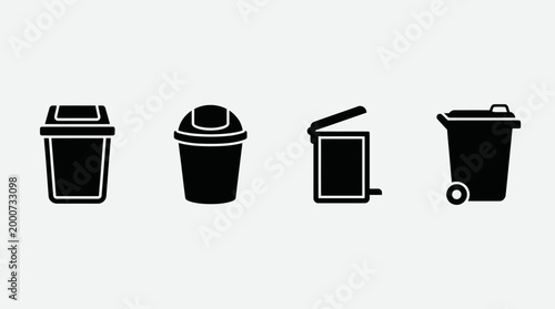 Set of four black silhouette trash cans and waste bins.
