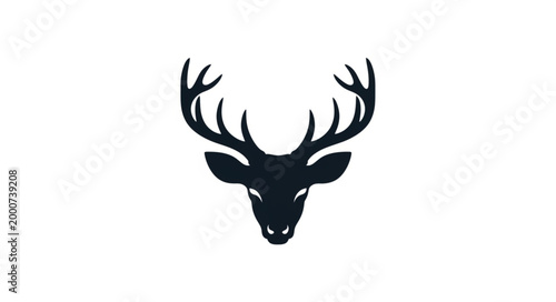 Silhouette of a majestic stag head with large antlers.