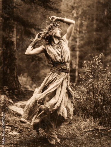 Celebrating Beltane with a forest witch in a dance of spring's awakening