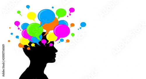 Silhouette of a persons head with colorful thought bubbles emerging.