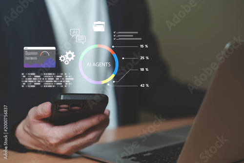 Businessman monitoring AI agents and automated data analytics using smartphone and laptop dashboard.