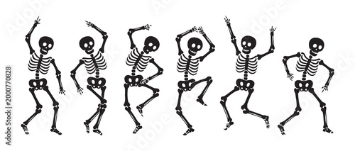 Black silhouette set of happy skeletons dancing and having fun isolated on a white background.